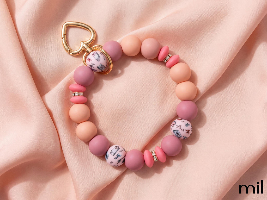 Silicone Bead Wristlet Keychain: Bookish, Pink, Rhinestone Accents, Gold Clasp