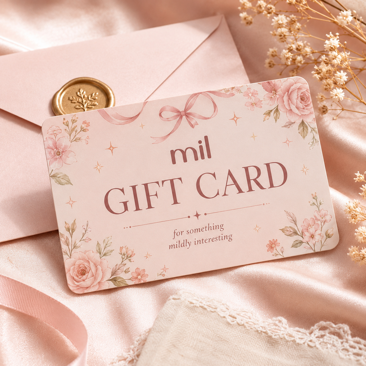 gift card on top of a pink envelope with a gold wax seal indicating that you can purchase something mildly interesting from a stationery and bookish gifts and sets shop